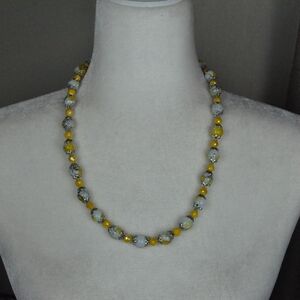 Sophisticated Yellow and Silver Necklace with Classic Strand Design